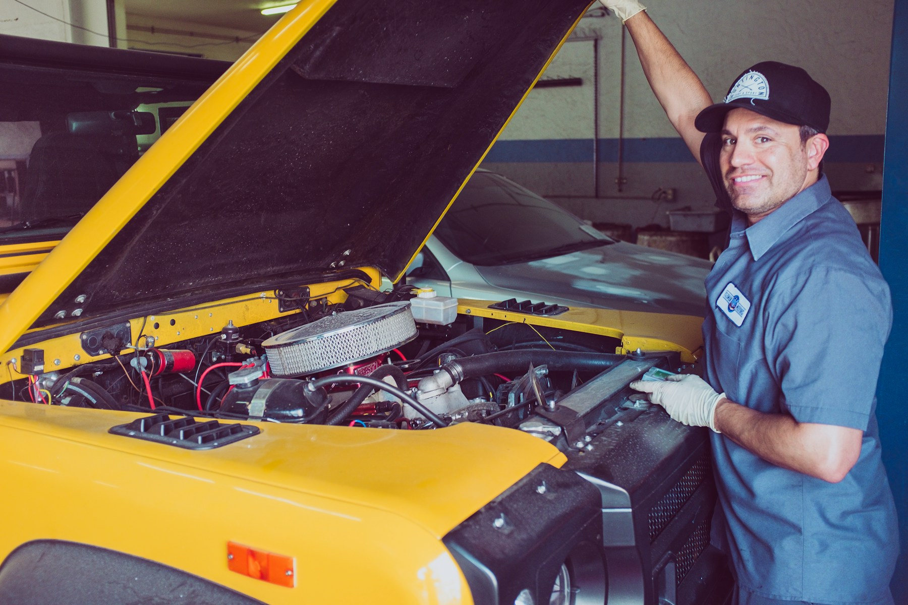 Workshop bay with overhead exhaust extraction
